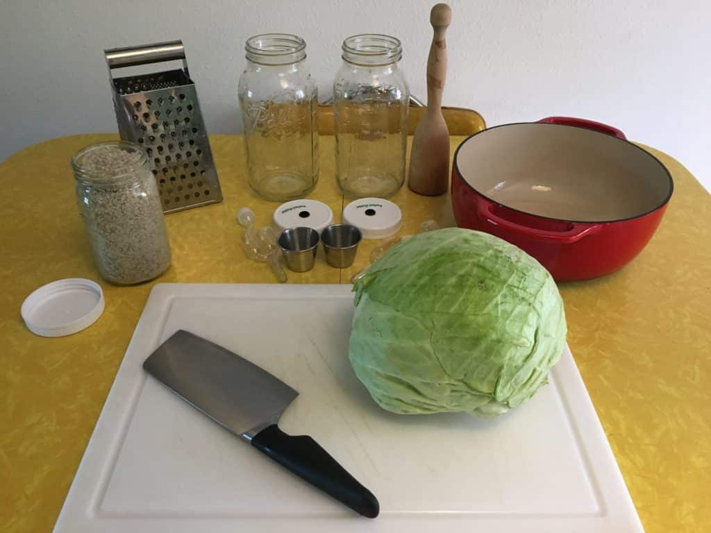 various tools and supplies to prep for making sauerkraut